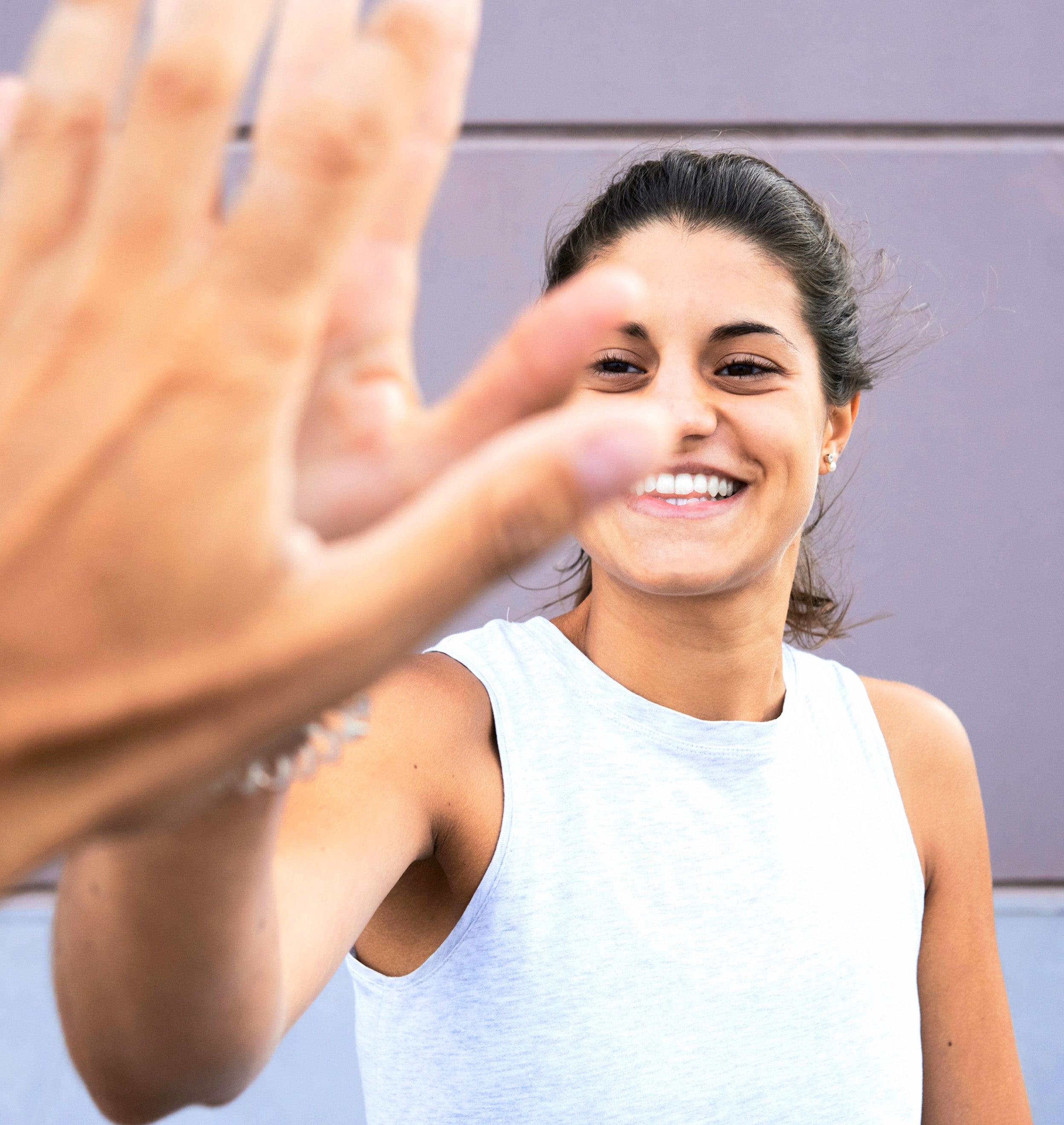 lady high-fiving